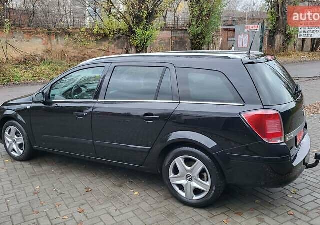 Черный Опель Астра, объемом двигателя 1.8 л и пробегом 165 тыс. км за 5650 $, фото 4 на Automoto.ua