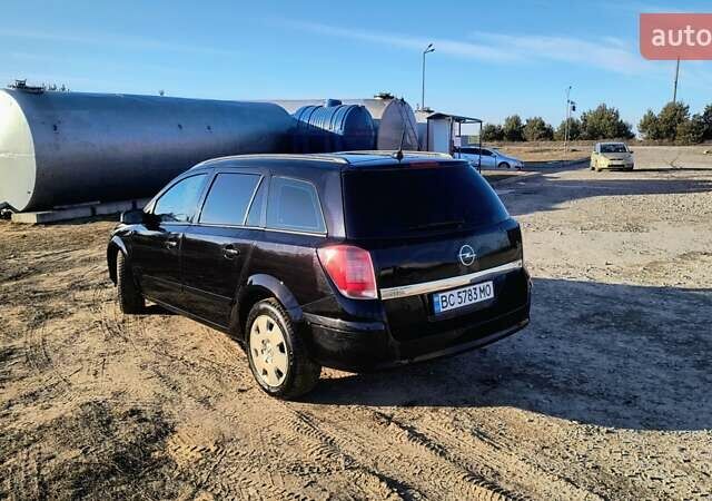 Черный Опель Астра, объемом двигателя 1.8 л и пробегом 245 тыс. км за 4900 $, фото 32 на Automoto.ua