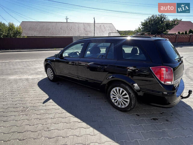 Черный Опель Астра, объемом двигателя 1.6 л и пробегом 270 тыс. км за 4200 $, фото 1 на Automoto.ua