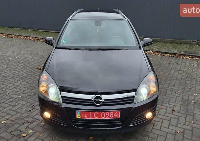 Черный Опель Астра, объемом двигателя 1.8 л и пробегом 165 тыс. км за 5650 $, фото 18 на Automoto.ua