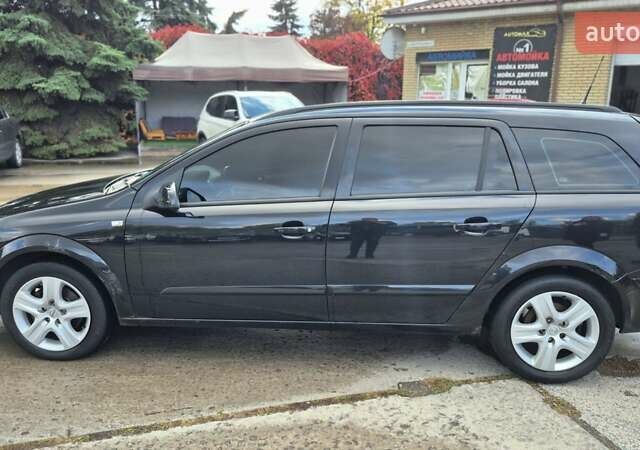 Черный Опель Астра, объемом двигателя 1.6 л и пробегом 264 тыс. км за 4700 $, фото 9 на Automoto.ua