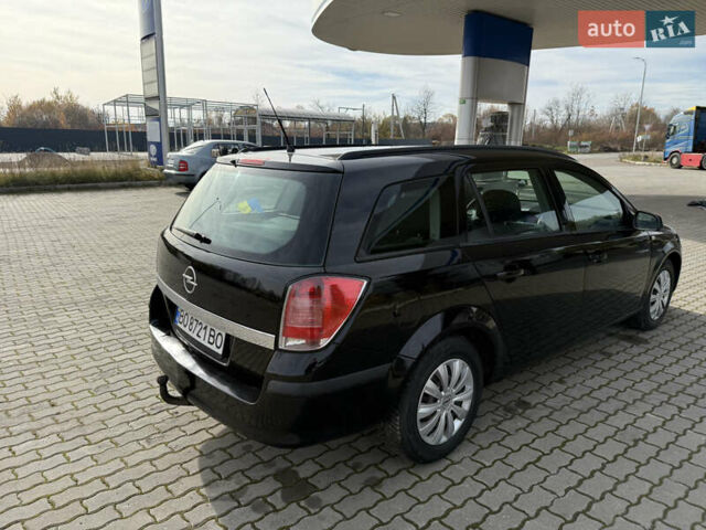 Черный Опель Астра, объемом двигателя 1.69 л и пробегом 420 тыс. км за 5500 $, фото 10 на Automoto.ua