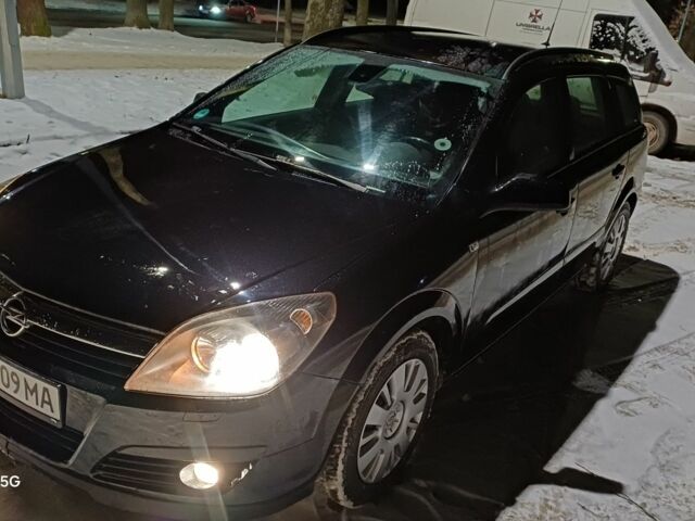 Черный Опель Астра, объемом двигателя 1.6 л и пробегом 243 тыс. км за 5498 $, фото 7 на Automoto.ua