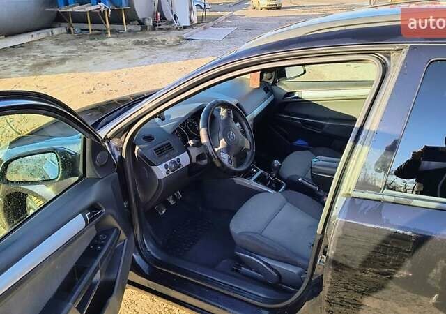 Черный Опель Астра, объемом двигателя 1.8 л и пробегом 245 тыс. км за 4900 $, фото 33 на Automoto.ua