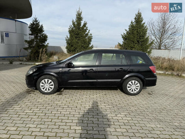 Черный Опель Астра, объемом двигателя 1.69 л и пробегом 420 тыс. км за 5500 $, фото 1 на Automoto.ua