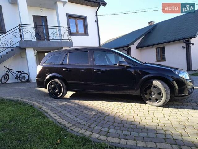 Черный Опель Астра, объемом двигателя 1.8 л и пробегом 245 тыс. км за 4900 $, фото 18 на Automoto.ua