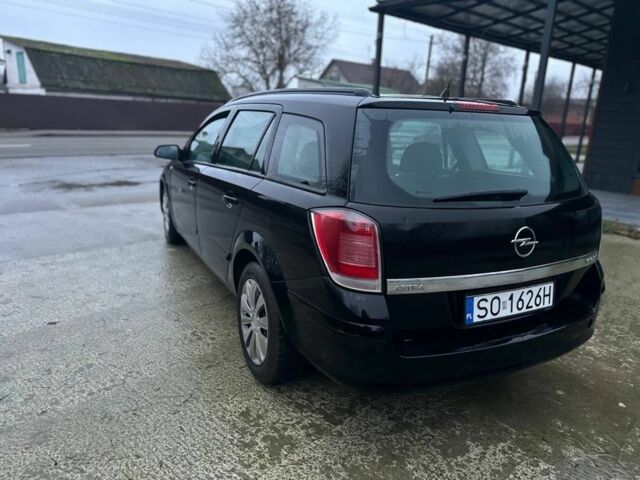 Черный Опель Астра, объемом двигателя 1.9 л и пробегом 300 тыс. км за 2500 $, фото 2 на Automoto.ua