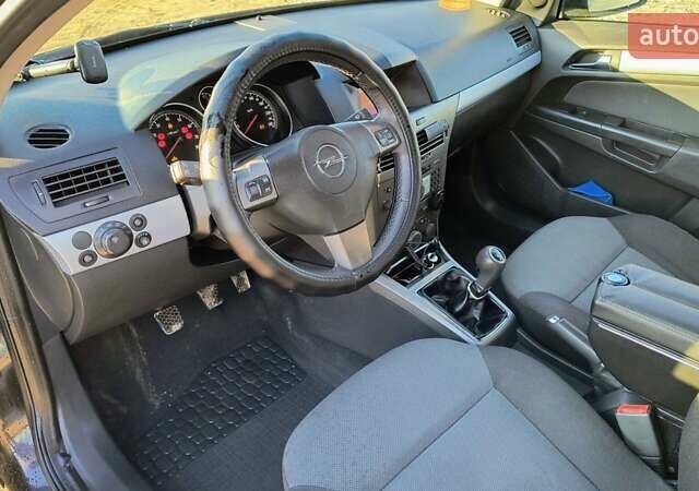 Черный Опель Астра, объемом двигателя 1.8 л и пробегом 245 тыс. км за 4900 $, фото 35 на Automoto.ua