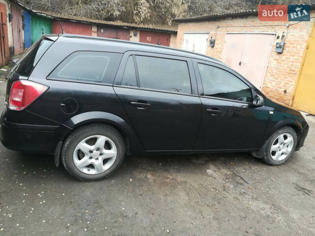 Черный Опель Астра, объемом двигателя 1.3 л и пробегом 163 тыс. км за 4900 $, фото 2 на Automoto.ua