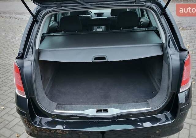 Черный Опель Астра, объемом двигателя 1.8 л и пробегом 165 тыс. км за 5650 $, фото 38 на Automoto.ua