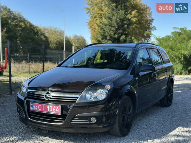 Черный Опель Астра, объемом двигателя 1.6 л и пробегом 241 тыс. км за 5700 $, фото 7 на Automoto.ua