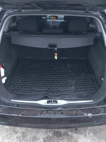 Черный Опель Астра, объемом двигателя 1.8 л и пробегом 260 тыс. км за 5200 $, фото 40 на Automoto.ua