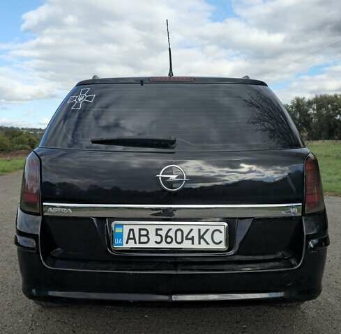 Черный Опель Астра, объемом двигателя 1.8 л и пробегом 260 тыс. км за 5200 $, фото 5 на Automoto.ua