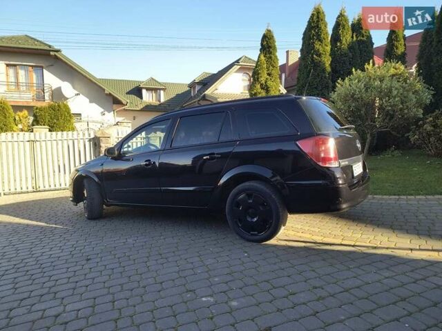 Черный Опель Астра, объемом двигателя 1.8 л и пробегом 245 тыс. км за 4900 $, фото 19 на Automoto.ua