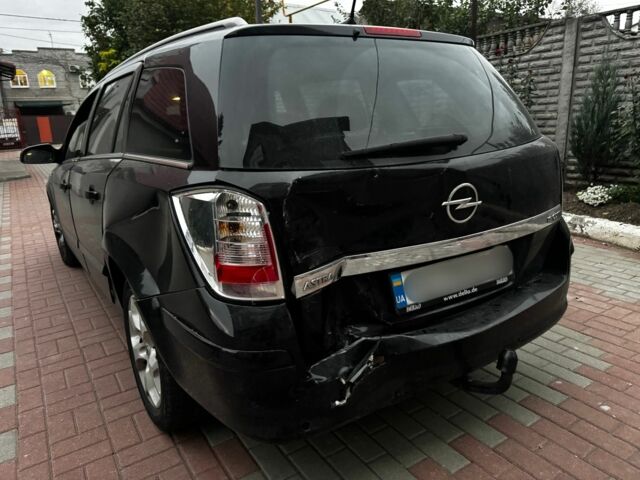 Черный Опель Астра, объемом двигателя 1.9 л и пробегом 311 тыс. км за 2930 $, фото 2 на Automoto.ua