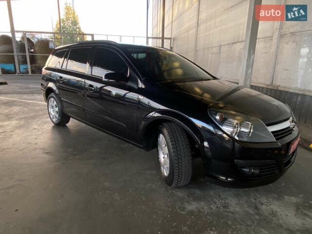 Черный Опель Астра, объемом двигателя 1.6 л и пробегом 207 тыс. км за 4999 $, фото 10 на Automoto.ua