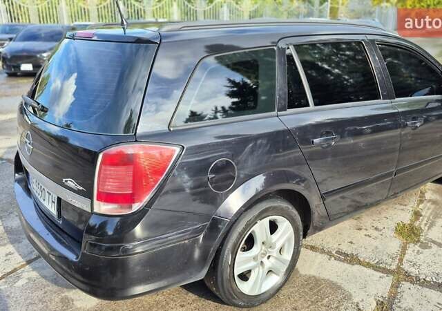 Черный Опель Астра, объемом двигателя 1.6 л и пробегом 264 тыс. км за 4700 $, фото 12 на Automoto.ua