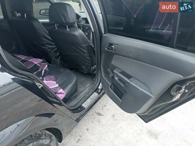 Черный Опель Астра, объемом двигателя 1.9 л и пробегом 280 тыс. км за 6400 $, фото 5 на Automoto.ua