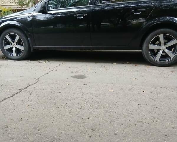 Черный Опель Астра, объемом двигателя 1.2 л и пробегом 350 тыс. км за 4400 $, фото 4 на Automoto.ua