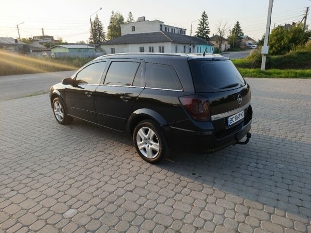 Черный Опель Астра, объемом двигателя 1.6 л и пробегом 230 тыс. км за 3900 $, фото 3 на Automoto.ua