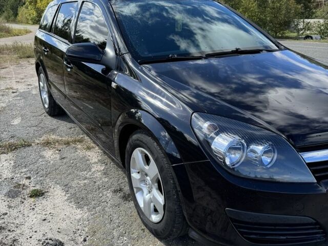 Черный Опель Астра, объемом двигателя 1.6 л и пробегом 248 тыс. км за 5200 $, фото 4 на Automoto.ua