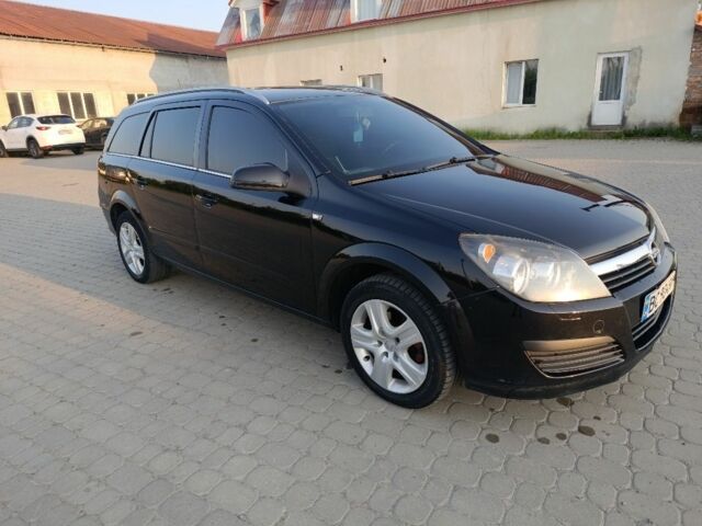 Черный Опель Астра, объемом двигателя 1.6 л и пробегом 230 тыс. км за 3900 $, фото 7 на Automoto.ua