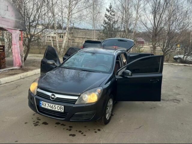 Черный Опель Астра, объемом двигателя 1.2 л и пробегом 300 тыс. км за 3400 $, фото 1 на Automoto.ua