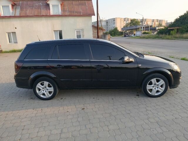 Черный Опель Астра, объемом двигателя 1.6 л и пробегом 230 тыс. км за 3900 $, фото 6 на Automoto.ua