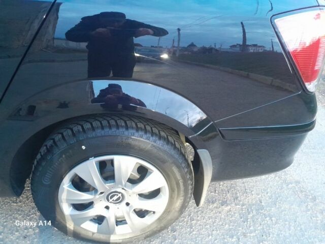 Черный Опель Астра, объемом двигателя 1 л и пробегом 154 тыс. км за 5250 $, фото 9 на Automoto.ua