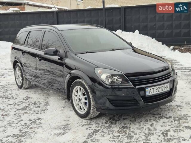 Черный Опель Астра, объемом двигателя 1.9 л и пробегом 235 тыс. км за 5900 $, фото 25 на Automoto.ua