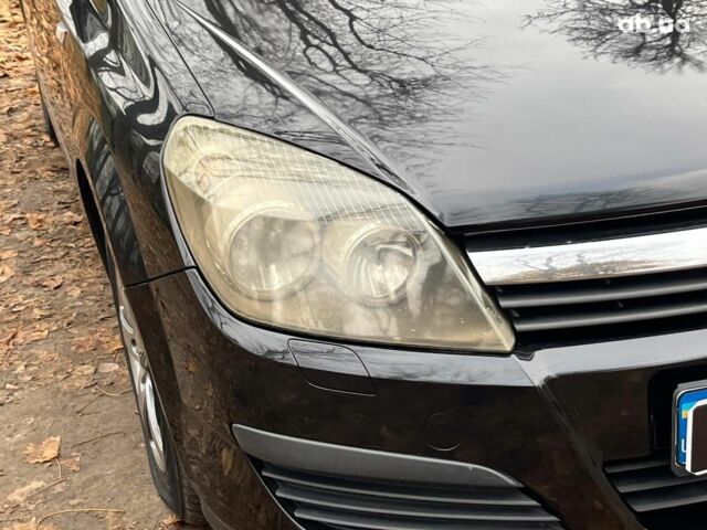 Черный Опель Астра, объемом двигателя 1.6 л и пробегом 340 тыс. км за 5140 $, фото 3 на Automoto.ua