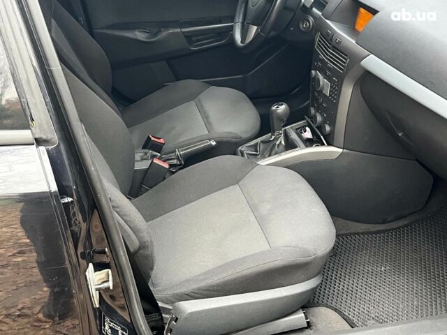 Черный Опель Астра, объемом двигателя 1.6 л и пробегом 340 тыс. км за 5140 $, фото 15 на Automoto.ua