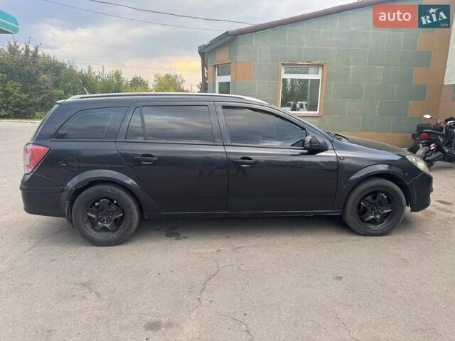 Чорний Опель Астра, об'ємом двигуна 1.25 л та пробігом 370 тис. км за 3100 $, фото 2 на Automoto.ua