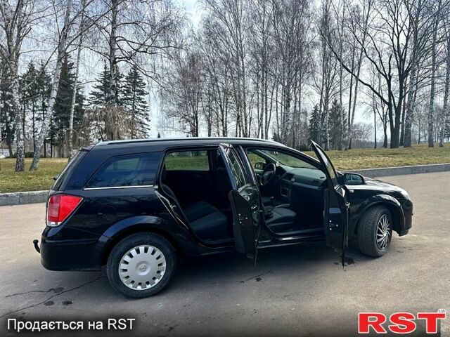 Черный Опель Астра, объемом двигателя 1.6 л и пробегом 232 тыс. км за 4800 $, фото 4 на Automoto.ua
