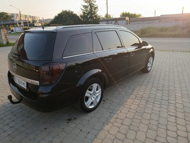 Черный Опель Астра, объемом двигателя 1.6 л и пробегом 230 тыс. км за 3900 $, фото 5 на Automoto.ua