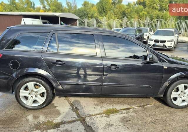 Черный Опель Астра, объемом двигателя 1.6 л и пробегом 264 тыс. км за 4700 $, фото 3 на Automoto.ua