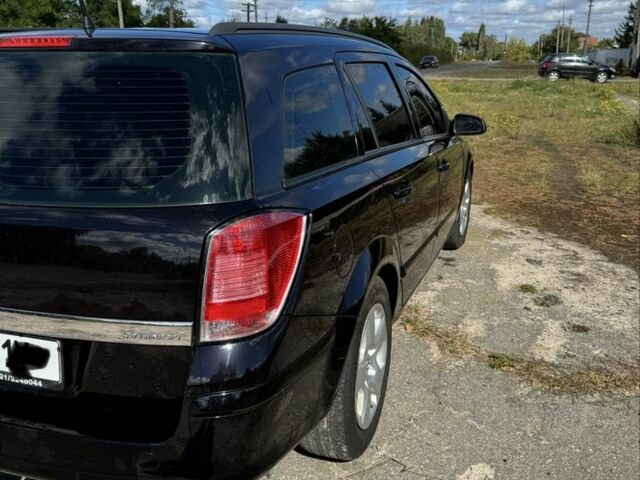 Черный Опель Астра, объемом двигателя 1.6 л и пробегом 248 тыс. км за 5200 $, фото 3 на Automoto.ua