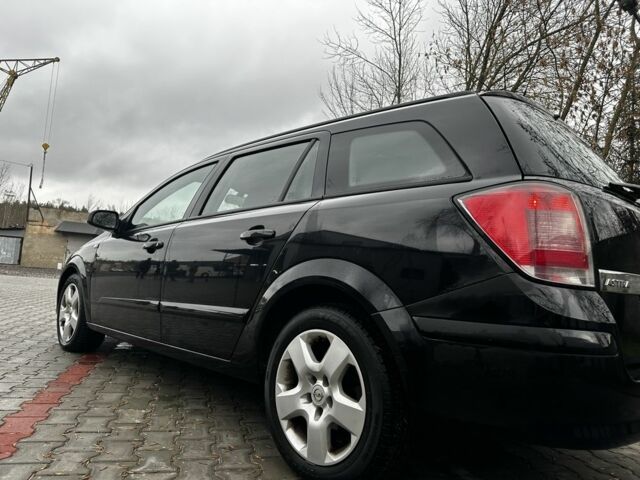 Черный Опель Астра, объемом двигателя 1.9 л и пробегом 286 тыс. км за 2050 $, фото 2 на Automoto.ua