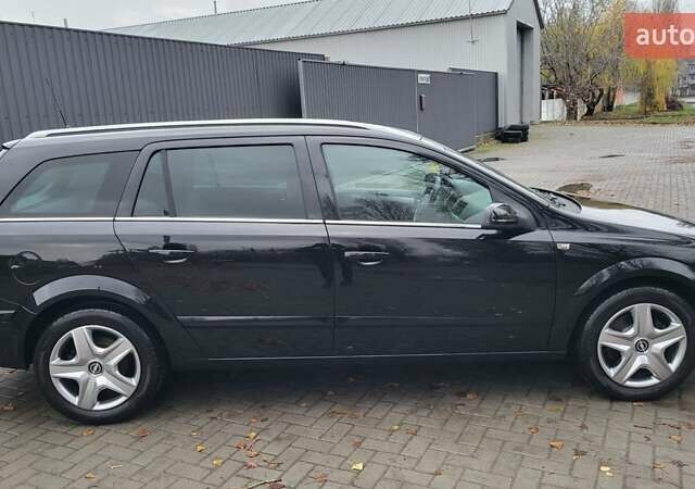 Черный Опель Астра, объемом двигателя 1.8 л и пробегом 165 тыс. км за 5650 $, фото 13 на Automoto.ua