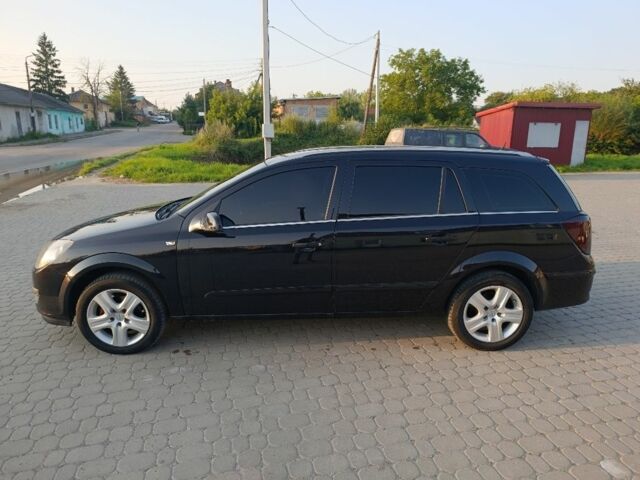 Черный Опель Астра, объемом двигателя 1.6 л и пробегом 230 тыс. км за 3900 $, фото 2 на Automoto.ua