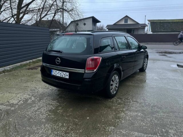 Черный Опель Астра, объемом двигателя 1.9 л и пробегом 300 тыс. км за 2500 $, фото 6 на Automoto.ua