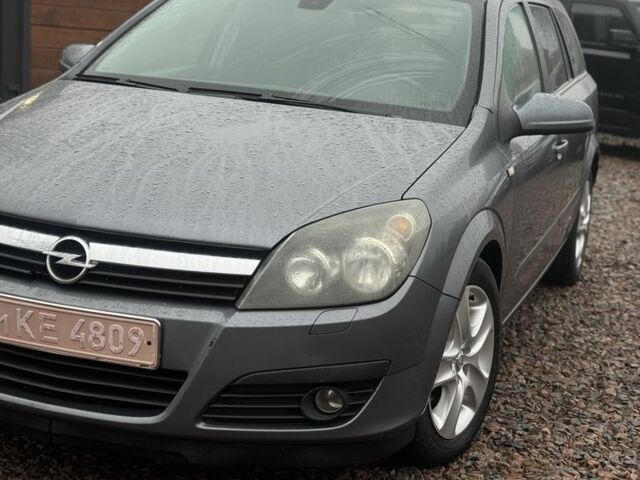 Чорний Опель Астра, об'ємом двигуна 1.6 л та пробігом 261 тис. км за 3999 $, фото 1 на Automoto.ua