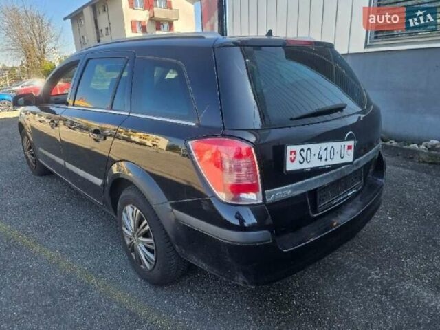 Черный Опель Астра, объемом двигателя 1.8 л и пробегом 223 тыс. км за 6500 $, фото 2 на Automoto.ua