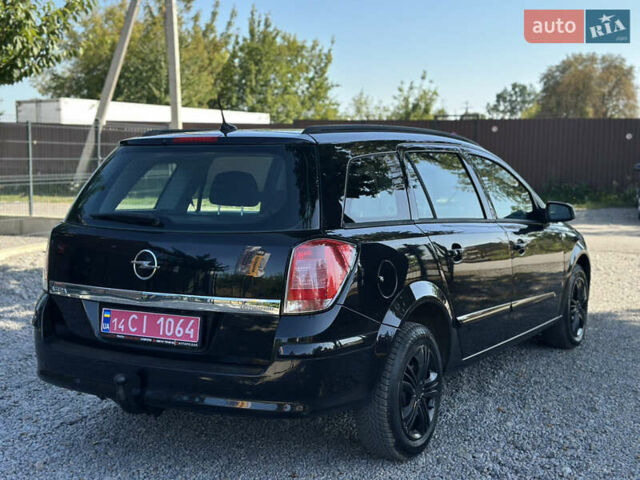 Черный Опель Астра, объемом двигателя 1.6 л и пробегом 241 тыс. км за 5700 $, фото 12 на Automoto.ua