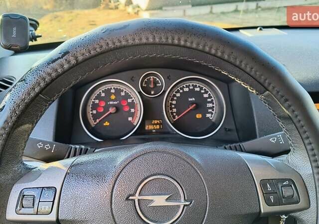 Черный Опель Астра, объемом двигателя 1.8 л и пробегом 245 тыс. км за 4900 $, фото 34 на Automoto.ua