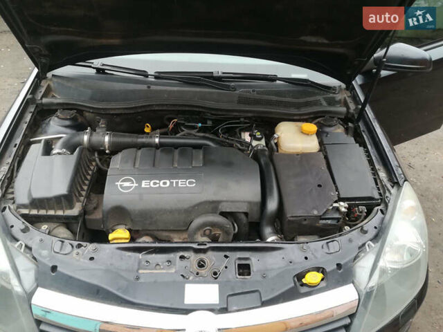 Черный Опель Астра, объемом двигателя 1.3 л и пробегом 163 тыс. км за 4900 $, фото 3 на Automoto.ua