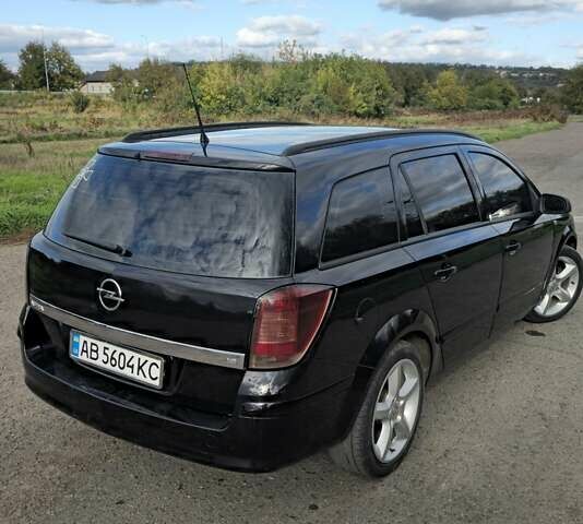 Черный Опель Астра, объемом двигателя 1.8 л и пробегом 260 тыс. км за 5200 $, фото 4 на Automoto.ua