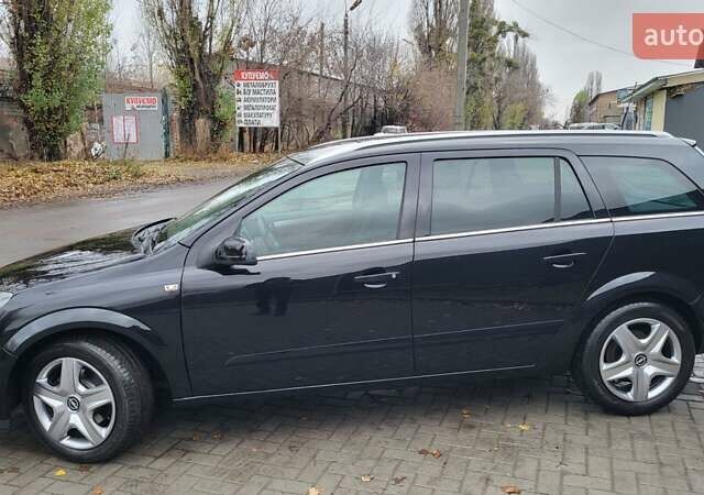 Черный Опель Астра, объемом двигателя 1.8 л и пробегом 165 тыс. км за 5650 $, фото 7 на Automoto.ua