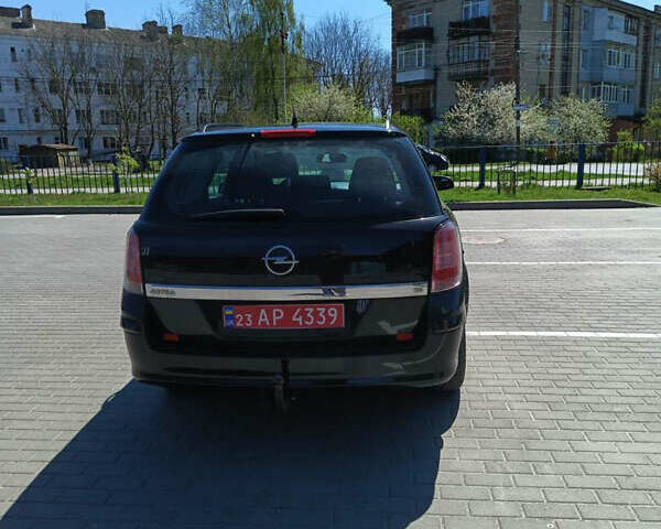 Черный Опель Астра, объемом двигателя 1.6 л и пробегом 230 тыс. км за 4999 $, фото 9 на Automoto.ua