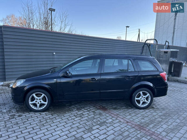Черный Опель Астра, объемом двигателя 1.6 л и пробегом 228 тыс. км за 4400 $, фото 1 на Automoto.ua